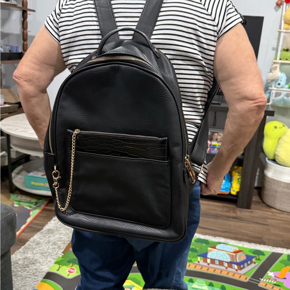 Aldo black leather backpack.